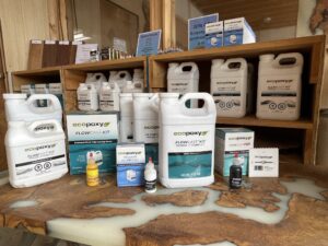EcoEpoxy products shown displayed on a river table